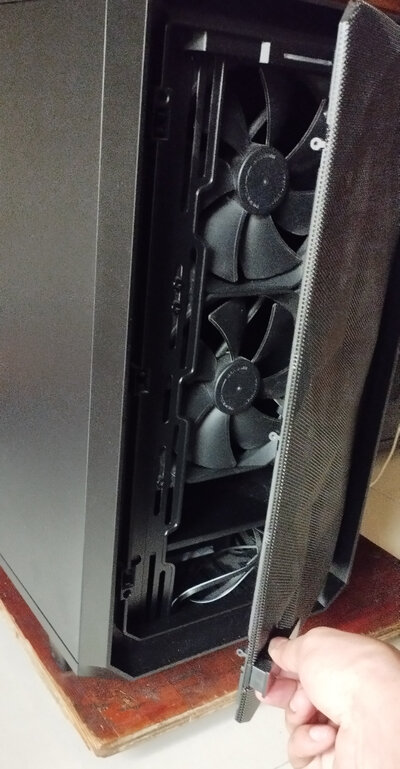 A photo of me opening the front panel of my Computer case